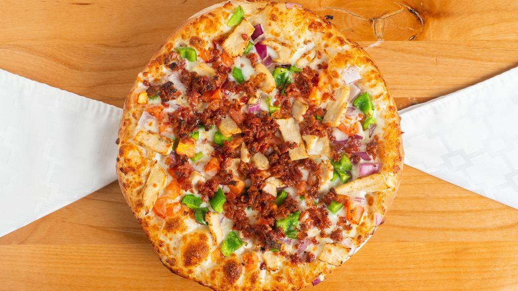 Chicken Bacon Ranch Pizza · Creamy ranch sauce, garlic chicken, bacon, mozzarella cheese, green bell peppers, tomatoes and red onions.