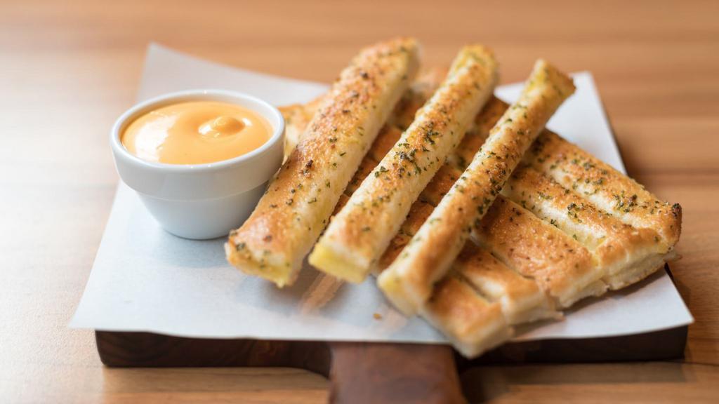 Garlic Sticks · Fresh garlic breadsticks.