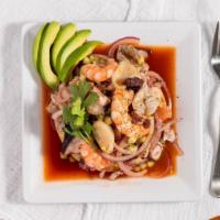 Tostada Cachoreada · Fresh shrimp, cooked shrimp, octopus and scallops