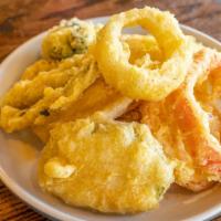 Tempura Vegetables · Broccoli, onion, bell pepper, yam and zucchini dipped in tempura and lightly fried.