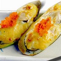 Green Mussels · Two pieces of green mussels baked with a mayo sauce, green onion, & masago on top.