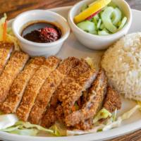 Ton Katsu · Pork tenderloin breaded with panko and lightly fried with a side of cucumber salad.