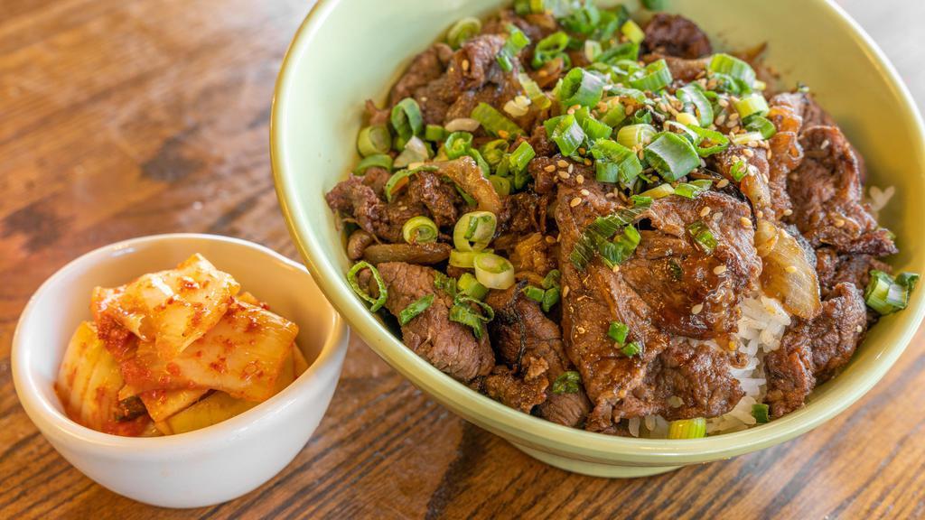 Rib Eye Bulgogi Rice Bowl · Thin slices of rib-eye steak marinated in a Korean style house sauce, stir fried with sweet onions and served over rice.