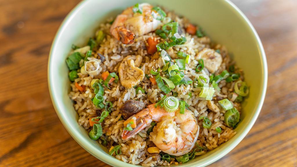Fried Rice Combination · Fried rice with stir fried vegetables, egg, Chicken Breast, NY Steak, and Shrimp