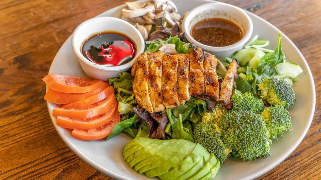 Teriyaki Chicken Salad · Teriyaki chicken breast with green spring mix, carrots, and avocados served with a ginger dressing.