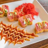 Sunset Roll · Salmon, tuna, spicy tuna, avocado, and crab wrapped in soy paper. (No Rice). With tempura fl...