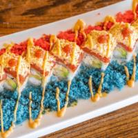Wild Roll · Shrimp tempura, crab with mayo, & avocado inside. Blue tempura flakes on the outside with sp...