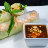  Cuốn/Fresh Spring Rolls · 2 rice papers wrapped.  Includes: lettuce, sprouts, pickled carrots, cucumber, cilantro. Ser...