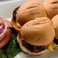 Grabbers (6) · Six mini burgers served with Cheddar cheese and  a pickle