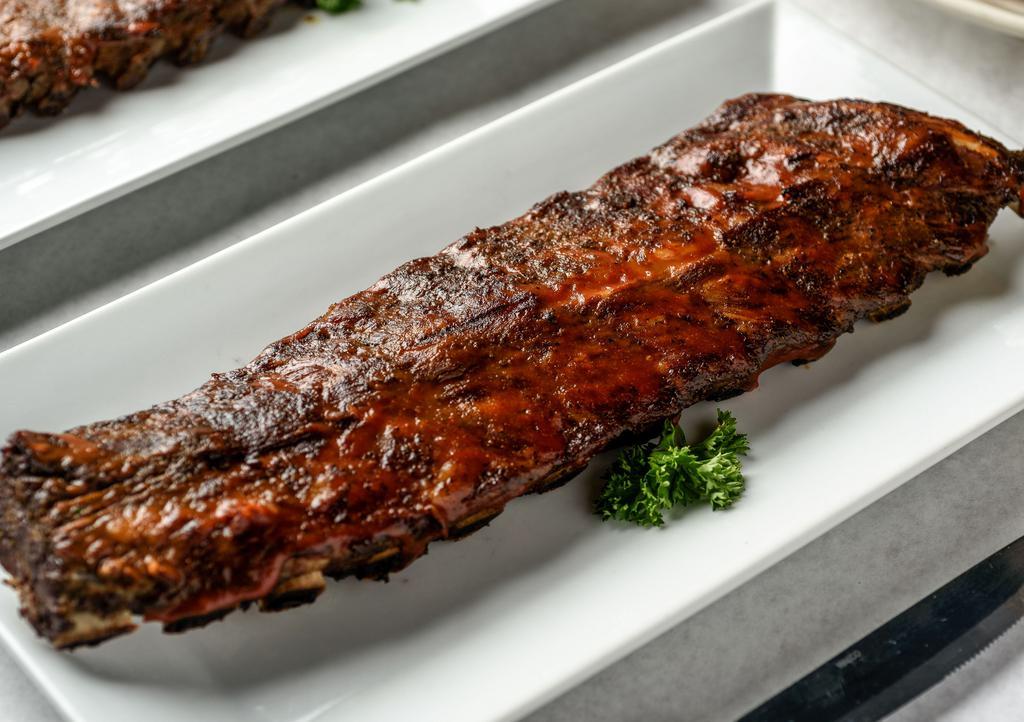 Full Rack Ribs · 1.5 Pound Full Rack Marinated for 24 hours, slow cooked in our special oven, then finished on the grill, and lightly glazed with BBQ sauce.