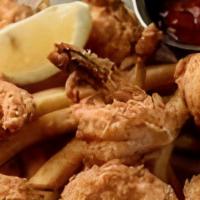 Fried Shrimp · Eight butterflied jumbo shrimp lightly battered and fried to a golden brown. Served over a b...