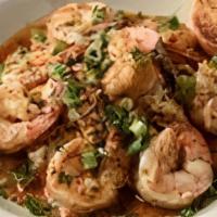 Bbq Shrimp · Eight butterflied jumbo shrimp sautéed in a BBQ butter sauce served over garlic mashed potat...