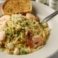 Shrimp And Scallop Pasta Alfredo · Shrimp and scallops sautéed in our uniquely blended sauce and served over linguine pasta. Se...