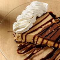 Satin Pie · A graham cracker bottom topped with a mixture of peanut butter and cream cheese. Then swirle...