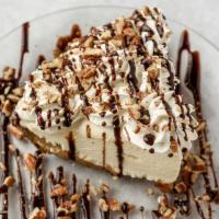 Pecan Meltaway · A chocolate crust with a thin layer of homemade caramel. French vanilla ice cream is then st...