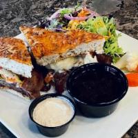 French Dip · Roast beef with au jus on toasty focaccia with melted gruyere and spicy giardiniera, and a s...