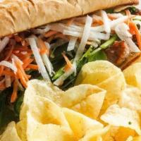 Banh Mi · Toasted hoagie filled with Asian style pulled pork, pickled jicama and carrots, cilantro and...