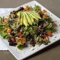 Black Bean Quinoa Salad · (GF) (VEG) Spring mix tossed in a cilantro cumin vinaigrette, topped with diced tomatoes, bl...