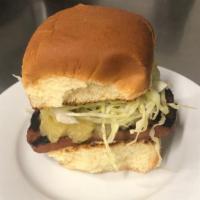 Spam Slammer · Grilled spam with teriyaki, mustard, pineapple, house aioli and shaved cabbage on sweet Hawa...