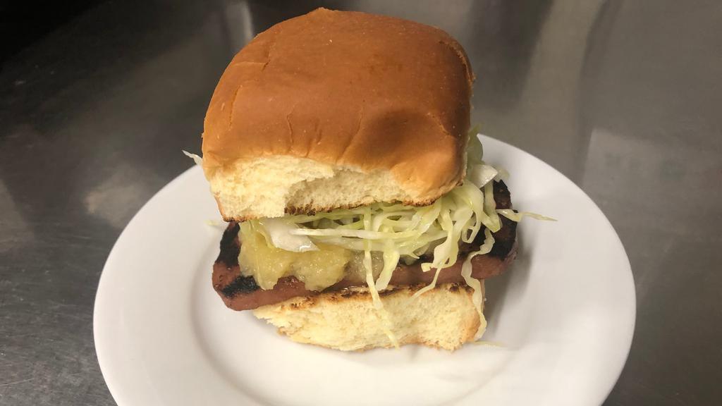 Spam Slammer · Grilled spam with teriyaki, mustard, pineapple, house aioli and shaved cabbage on sweet Hawaiian bun.
*2 per order