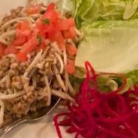 Mint Chicken Wrap · Minced chicken seasoned with lime juice, fish sauce and rice powder tossed with red onion, s...