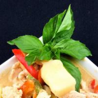 Yellow Curry  · Potato, carrot, bell pepper & onion in a creamy coconut yellow curry. Can be made vegan or G...