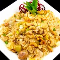 Exotic Fried Rice  · A Thai classic fried rice dish with pineapple, mushroom, white onion, and roasted cashews. C...