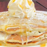 Churro Heaven Pancakes · 3 fluffy Buttermilk Pancakes. Layered with delicious sweet cream. Topped with cinnamon-sugar...