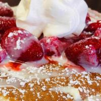 Strawberries & Cream Pancakes · 3 fluffy Buttermilk Pancakes. Layered with sweet cream. Topped with strawberries, condensed ...