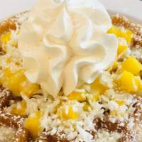 Mango Coconut Waffle · Belgian Waffle. Topped with diced Mango, coconut shavings, sweet condensed milk, whipped cre...