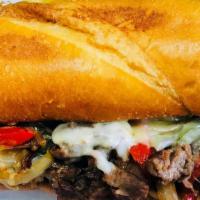 Philly Cheesesteak · Sautéed bell pepper and Onion with Thin sliced Steak, or Chicken, melted cheese with our hou...
