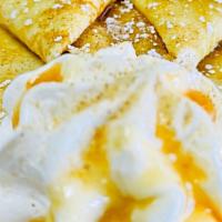 Churro Heaven Crepe · 2 Crepes smothered in our secret cream cheese and cinnamon flavored sugar, drizzled with dul...