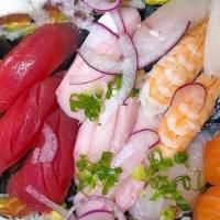 Sashimi Dinner · 15 of pcs of Assorted Chef’s Choice Sashimi. Served w/ a Miso Soup