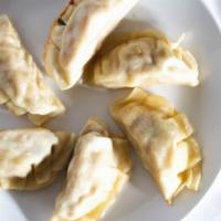 Pot Stickers · Six pan fried dumplings made fresh in our kitchen. Made to order so takes additional 15 minu...