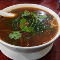 Chinese Style Beef Noodle Soup · Hot. Beef and soup over house noodles.