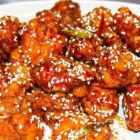 Sesame Crispy Chicken · Hot. Deep fried white meat chicken with tangy ginger glaze sauce.
