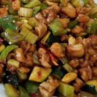 Kung Pao Chicken · Hot. Tender sautéed diced chicken with chili peppers, scallions and peanuts.
