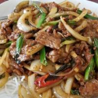 Mongolian Beef · Hot. Sauteed thinly sliced beef, white and green onions garnished with crispy rice noodles.