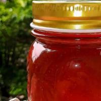 Honeee · A 4 oz jar of our housemade vegan honey. Return glass jar and lid for a $1 deposit refund.