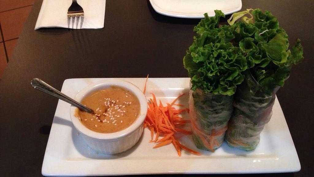 Fresh Rolls · Salad-like rice-paper rolls of shrimp, vermicelli noodles, cilantro, carrots, basil and fresh greens. Served with a sweet and sour peanut sauce