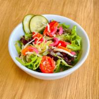 Mixed Green Salad · Base of fresh mixed greens, tomatoes, fresh cucumbers, pickled carrots, pickled red onions, ...