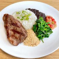 Picanha Steak (Top Sirloin Cap) · 6 oz of famous brazilian steak cut (prime part of the top sirloin) served with white rice, b...