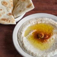 Eggplant Dip - Regular · Charbroiled eggplant mixed with sesame seed sauce, garlic, and lemon juice served with pita ...