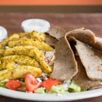 Gyros Combo Salad · Greek salad topped with lamb and chicken gyro.
