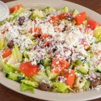 Greek Salad (Side) - Regular · Made with lettuce, pieces of tomatoes, diced cucumbers, onions, feta cheese, black olives, t...