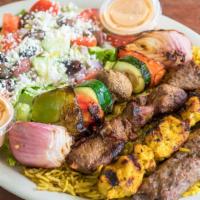 The Blazin' Platter · Four kebab skewers of fire grilled chicken, kafta and lamb and charbroiled vegetables. Serve...