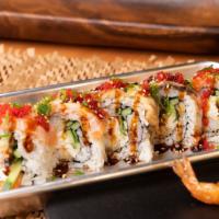 Ultimate · Shrimp tempura roll. Topped w/ seared salmon, unagi, tobiko, green onion and sesame seeds. U...