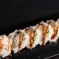 Shrimp Tempura Roll · Shrimp tempura, crab meat, avocado, cucumber, unagi sauce, sesame seeds.