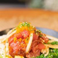 Tuna Poke Bowl · Fresh tuna, crab salad, seaweed salad, avocado, cucumber, rice