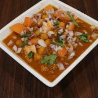 Chana Masala. · Popular Punjabi curry made with chickpeas onion, tomatoes, and house spices and served with ...